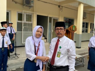 Sinta Lestari SMP YMIK Juara 1 Kelas D Pra Remaja Putri (39–42 kg) KEMENPORA International Pencak Silat Championship 2025